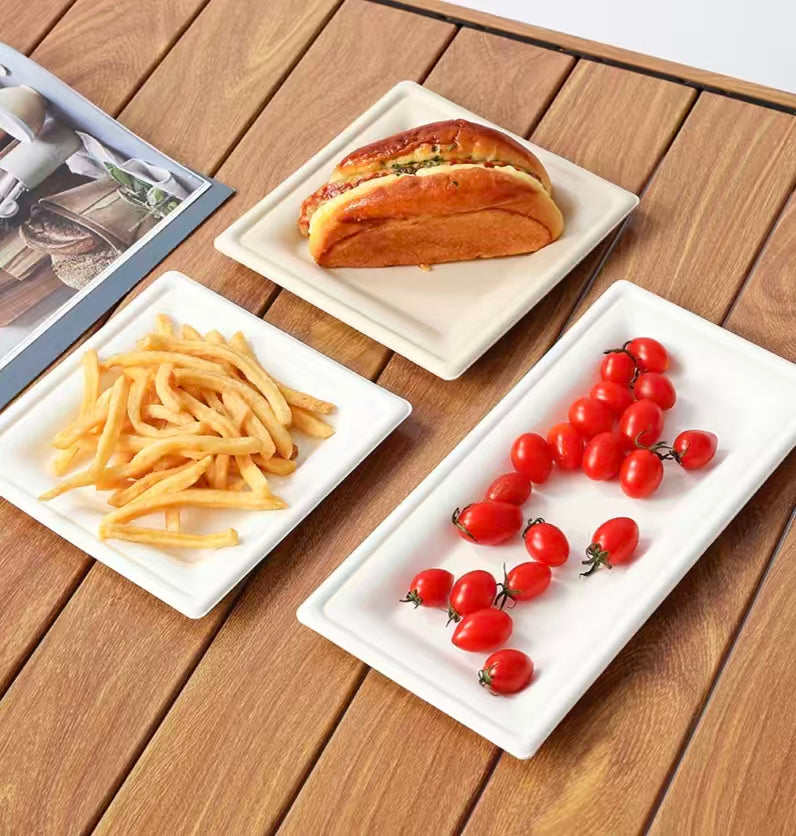 natural square compostable plate with food, eco-friendly disposable tray for meals 
