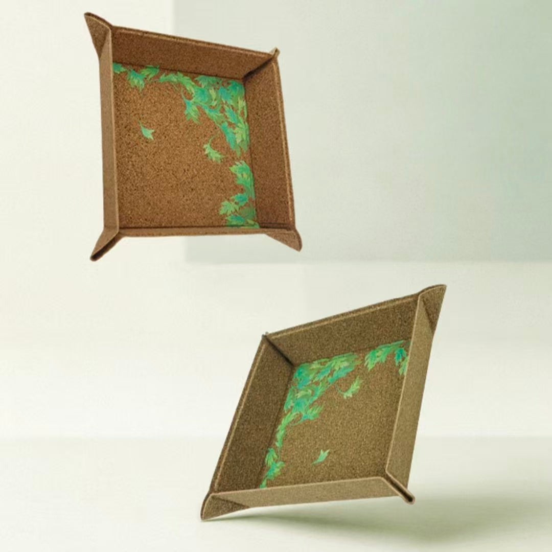 Dual angle shot of foldable mugwort fiber square tray, plastic-free herbal print jewelry storage dish