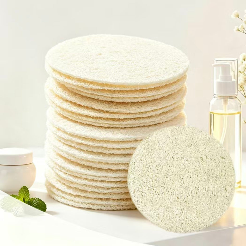 Plastic-free loofah exfoliating pad matched with skincare bottles, sustainable bathroom beauty supplies
