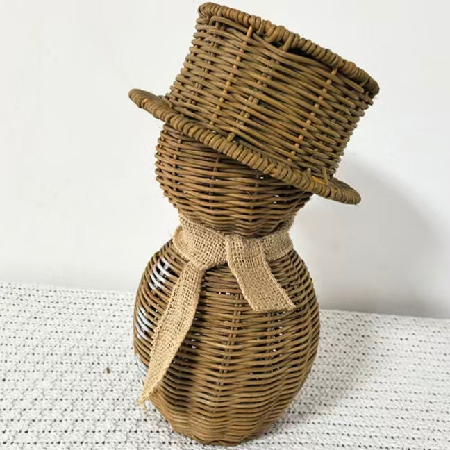  Close-up detail of the intricate hand-weaving texture on the top hat of the biodegradable natural rattan snowman ornament.