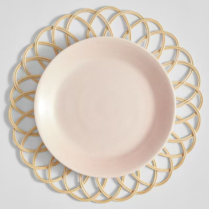  A soft pink minimalist ceramic dinner plate placed perfectly on the 38cm decorative natural rattan charger plate.
