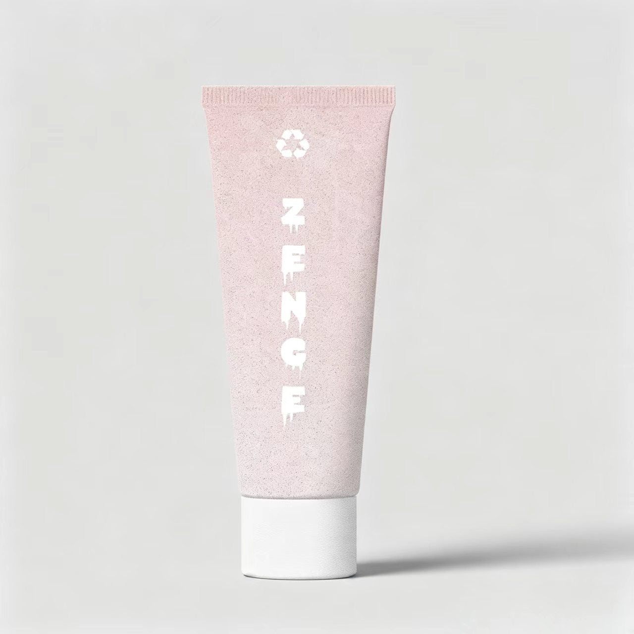 Eco-friendly flexible squeeze tube packaging in soft pink, featuring a natural bio-based texture and a white screw cap.