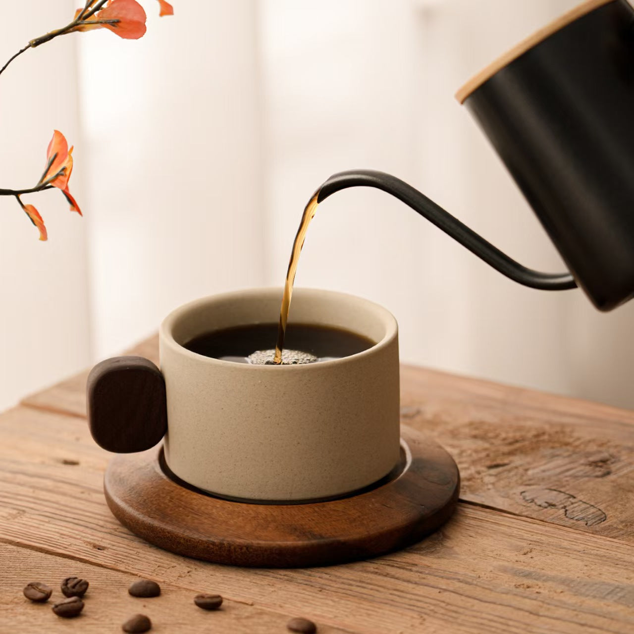 Terracotta stoneware coffee mug with solid wood handle, minimalist pour over coffee setup, rustic handmade wabi sabi tableware