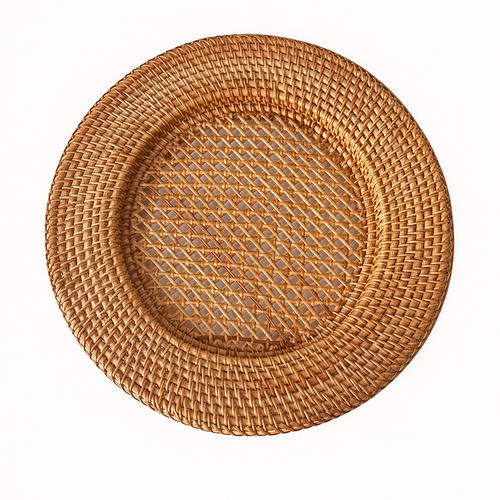 Handwoven round rattan charger plate with openwork weave center on white background by xuraneco