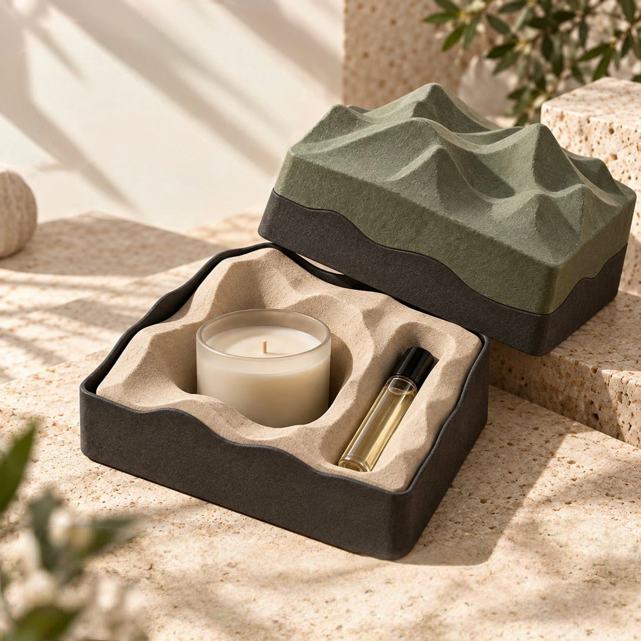 Candle and fragrance vial in a shaped protective insert