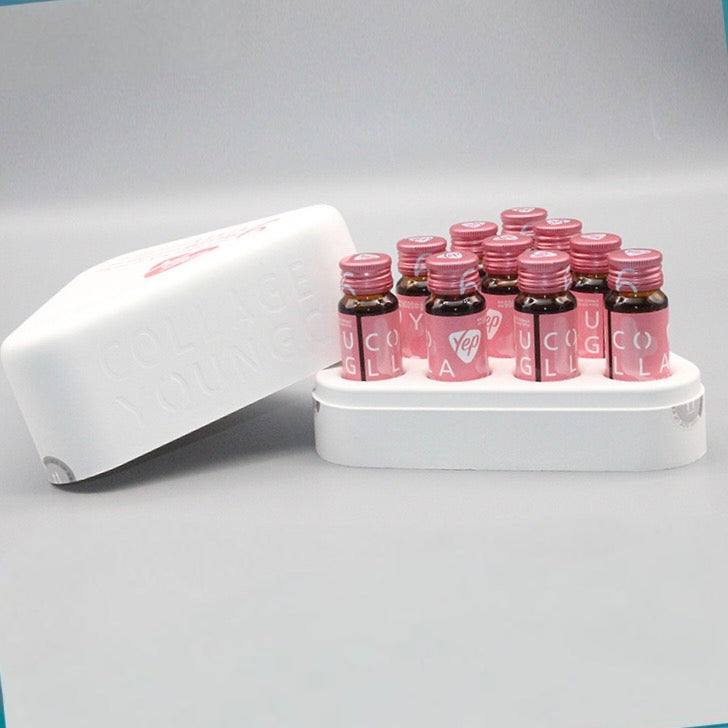 Small beverage bottles held in a shaped display tray
